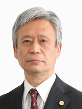 安達　賢二